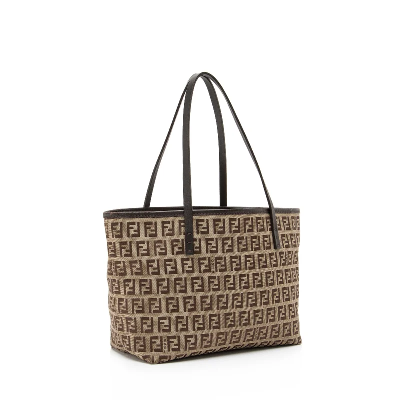 Fendi By The Way bags with a printed map pattern for a travel - inspired lookFendi Zucchino Mini Roll Tote (SHF-23562)