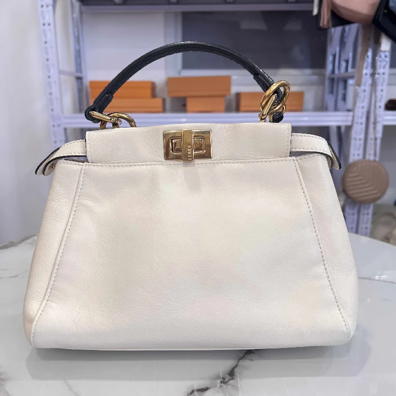 Fendi Baguette bags featuring the iconic FF logo plaque for a branded lookFendi Peekaboo White Leather Two-Way Bag Medium