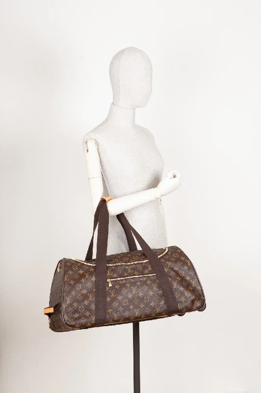 Louis Vuitton Twist bags with the iconic LV - turnlock closureLOUIS VUITTON Neo Eole 55 Bag MNG