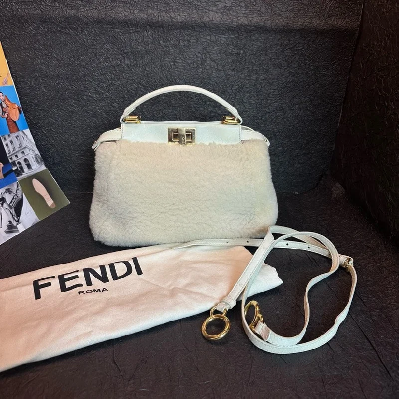 Ladies Fendi shoulder bags with a hidden magnetic pocket for discreet storageFendi Off White Lamb Wool Shoulder Bag 27cm