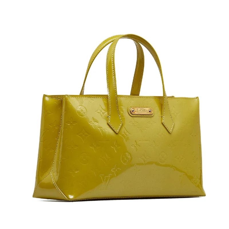 Louis Vuitton Alma bags featuring the signature top - handle designLOUIS VUITTON Monogram Vernis Wilshire PM Handbag