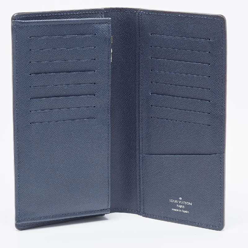 Louis Vuitton handbags with a patent - leather finish for a shiny lookLOUIS VUITTON Navy Blue Epi Leather Brazza Wallet