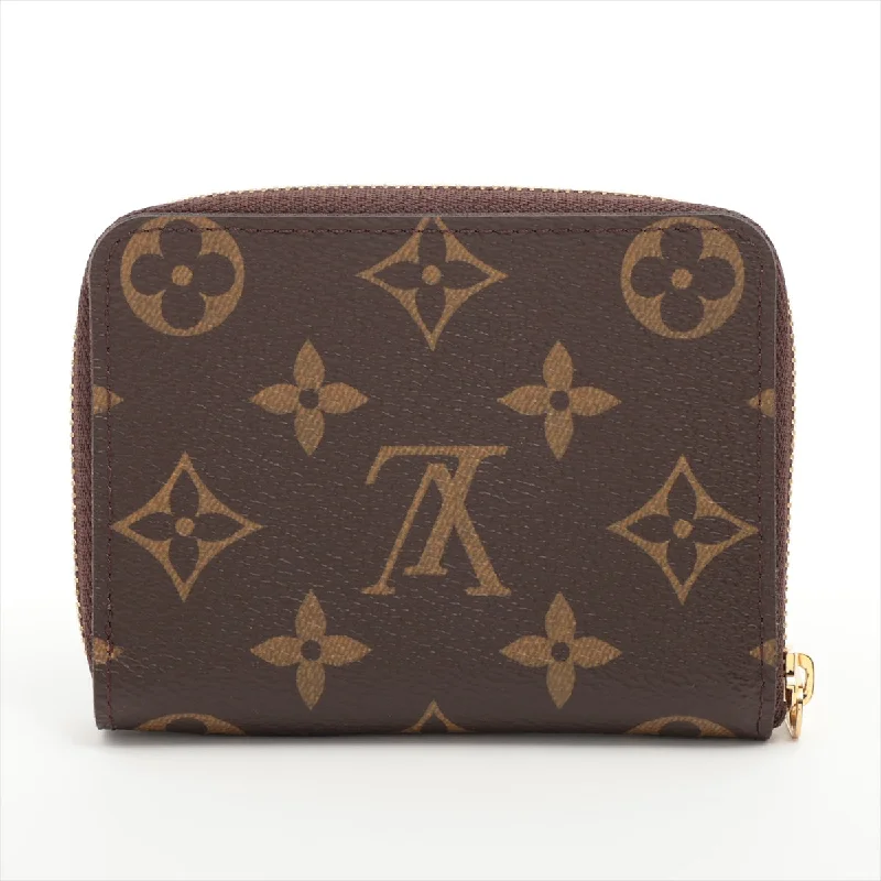 Louis Vuitton Alma bags featuring the signature top - handle designLouis Vuitton Monogram Zippy Coinpace M60067 Brown Coinpace