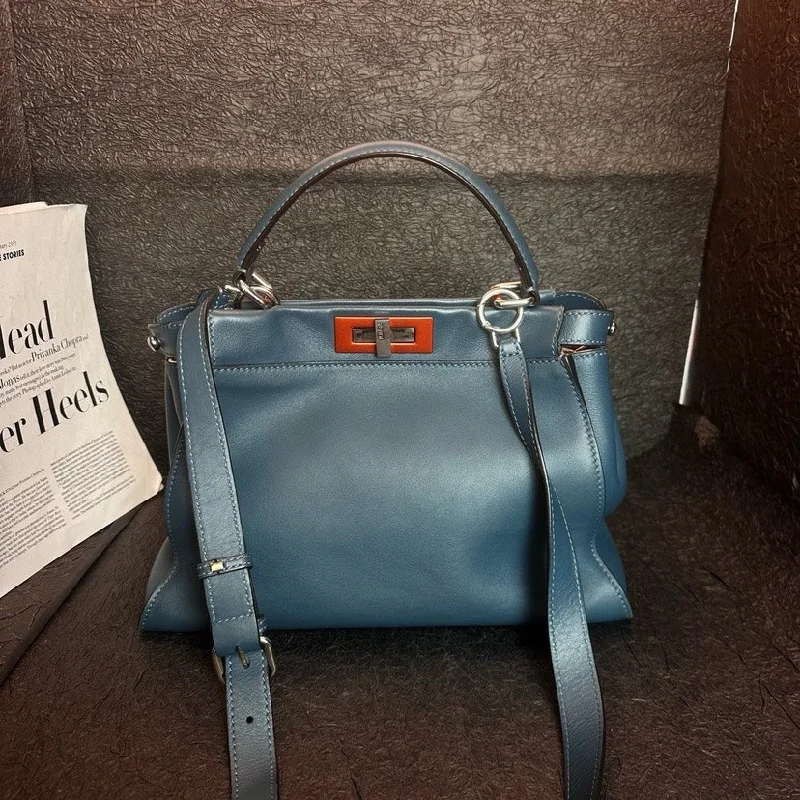 Fendi bags with a chain - link trim and a leather body for a modern and edgy lookFendi Peacock Blue Small Kelly Bag 34cm