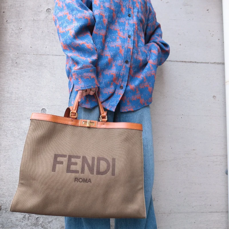 Fendi bags with a front - flap pocket and a turnlock for a classic and elegant aestheticFENDI Peekaboo X Canvas Leather 2Way Tote Bag Khaki Brown 8BH375