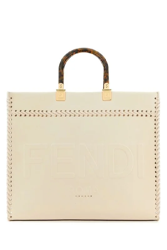 Fendi Baguette bags with a monogram - embossed leather surface for a luxurious feelFendi Women Ivory Leather Medium Sunshine Shopping Bag