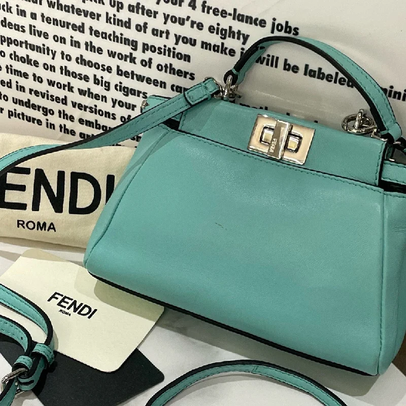 Ladies Fendi shoulder bags with a quilted leather exterior for a luxurious and cozy lookFendi Peekaboo Mini Light Blue Leather Handbag