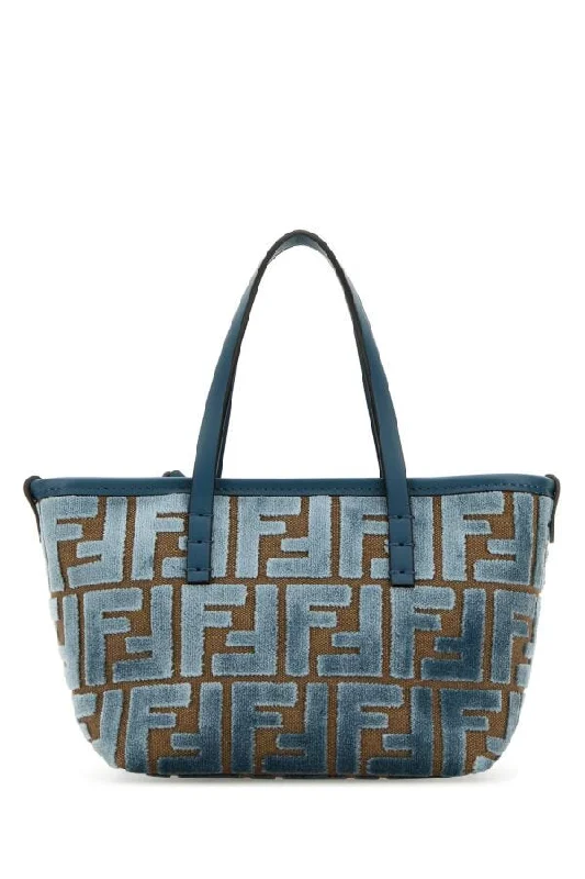 Fendi handbags with a perforated leather detail for a breathable and unique designFendi Women Embroidered Chenille Mini Roll Handbag