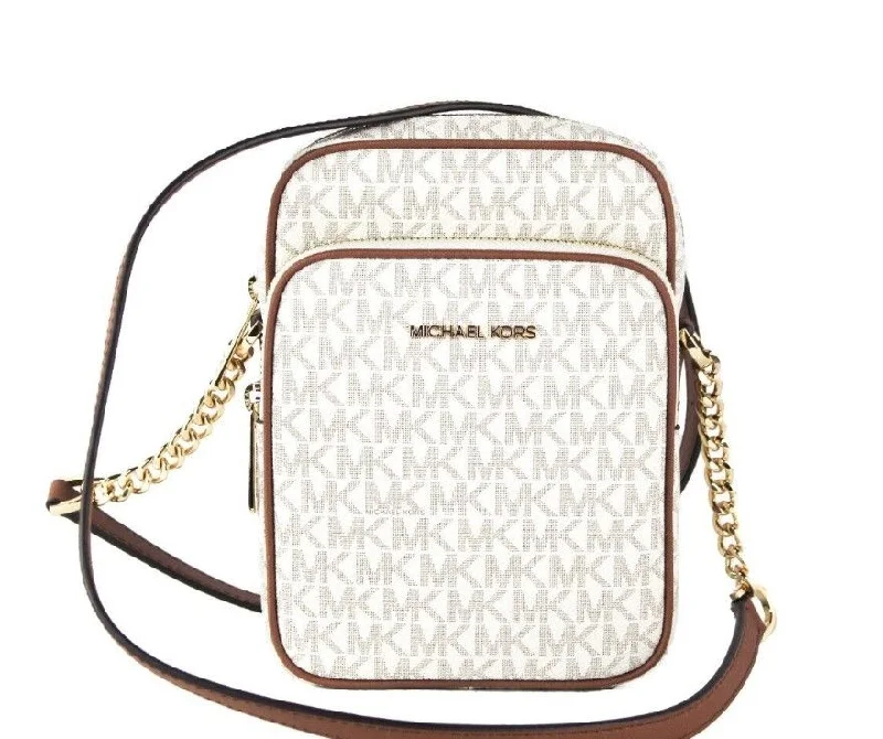 Michael Michael Kors Bags for opera nights in a glamorous and refined styleMichael Kors Jet Set Medium Vanilla PVC North South Chain Crossbody Handbag