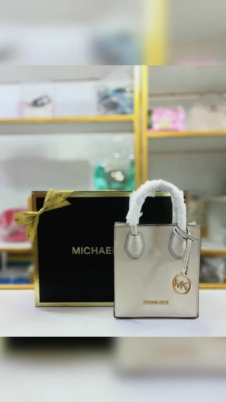 silver - accented Michael Michael Kors handbags for a modern edgeMichael Kors Mercer Mini crossbody bag -Offwhite