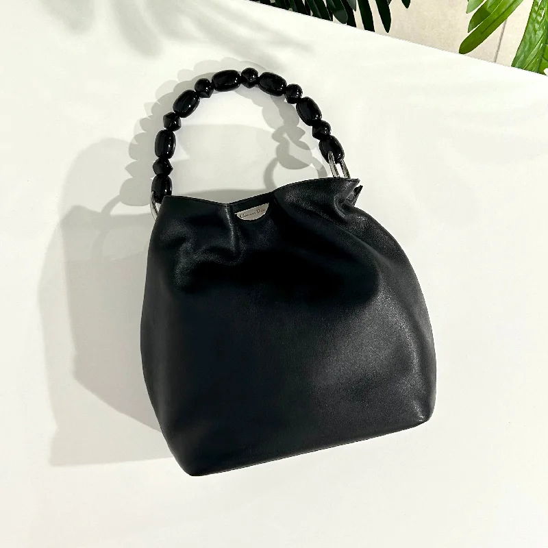 Christian Dior bags with a side - pocket for holding a water bottleDior Black Malice Bucket Bag