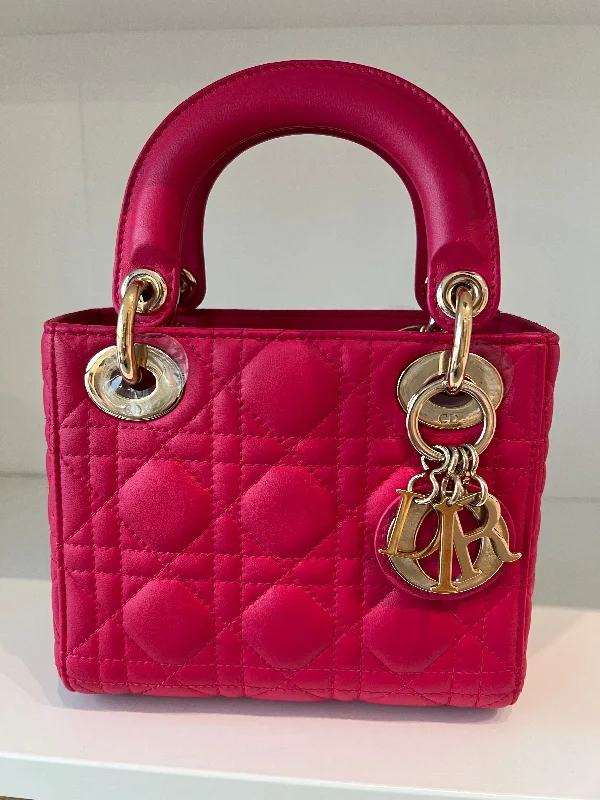 Christian Dior Saddle bags with a studded trim for a bold lookLady Dior Mini Dark Pink Lambskin GHW SYCM227