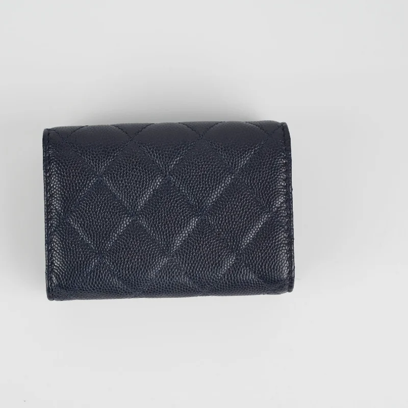 Chanel bags with iconic stitching detailsChanel Caviar Compact Wallet Navy