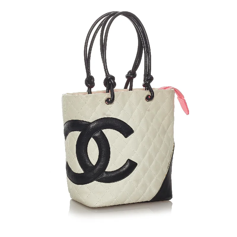 Chanel bags for those who value investment piecesChanel Cambon Ligne Lambskin Leather Tote Bag (27559)