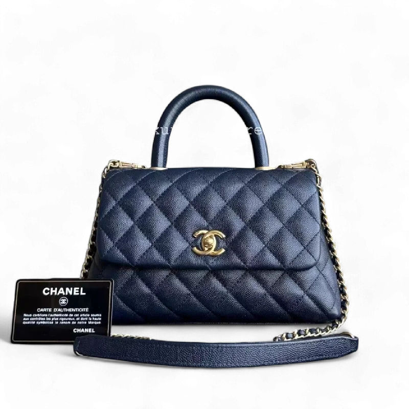 Chanel bags in luxury boutiques worldwideChanel Coco Handle Small - 24CM Caviar Quilted Navy Dark Blue Gold Hardware Series 27