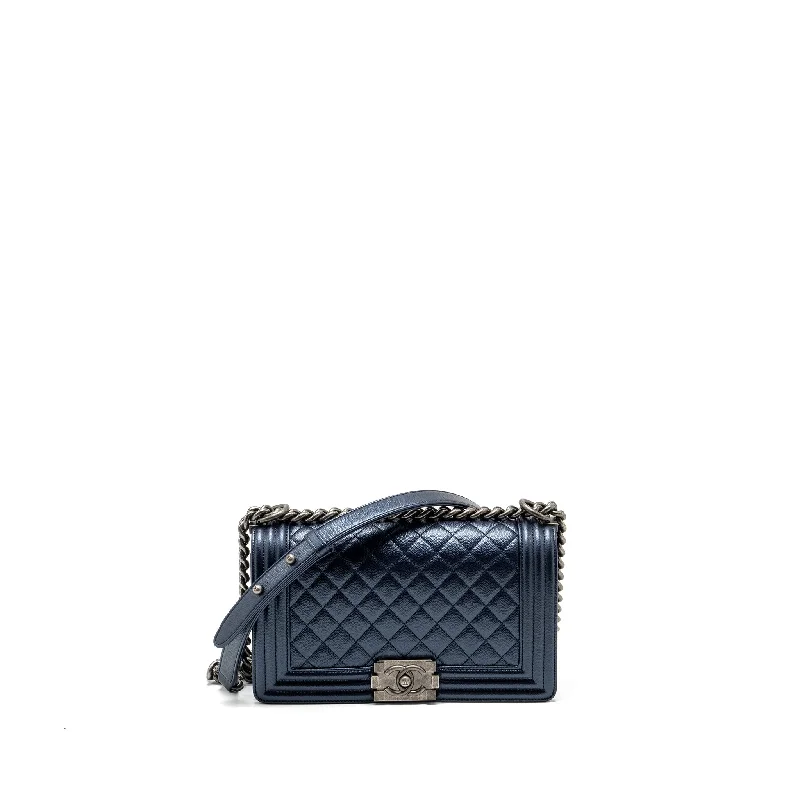 Chanel bags in luxury boutiques worldwideChanel medium boy bag caviar metallic blue ruthenium hardware