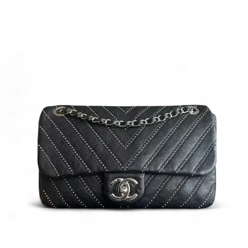 Chanel Quilted Leather Shoulder Bag for FashionistasChanel Seasonal Flap - Studded 28CM Chevron Calfskin Black Silver Hardware Series 24